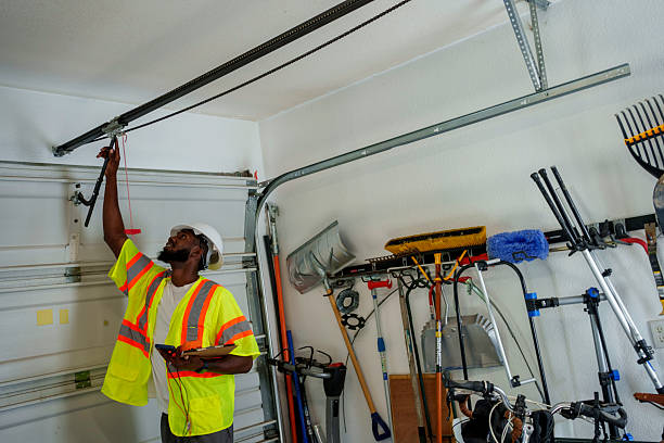 Professional Garage Door Panel Replacement technician working in Edgewood, NM
